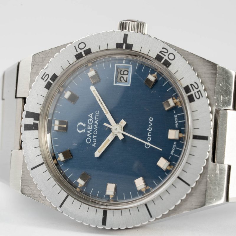 Vintage Omega Genève Diver 166.0124 with blue dial from 1972 laying watch